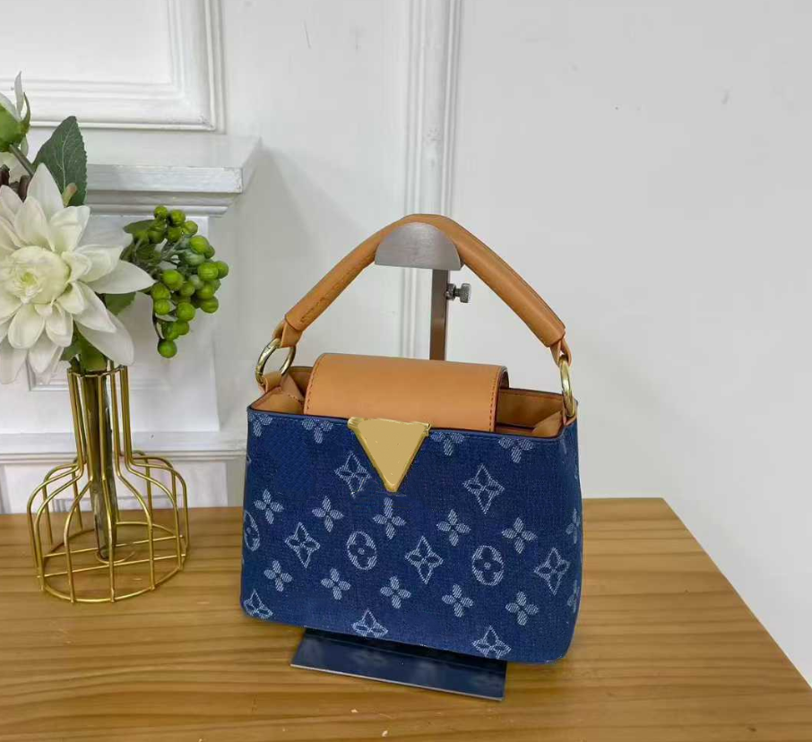 Blue Denim 25 Bag Luxury Designer Hobo Bucket Bag for Women Adjustable Drawstring Chain Strap Crossbody Purse with Two Side Pockets Size