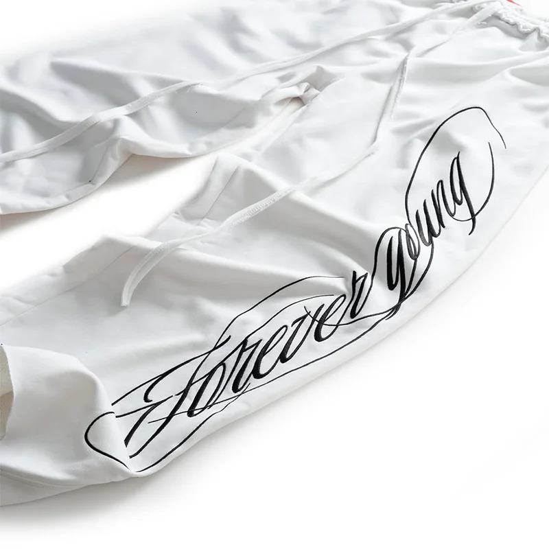 Y2K Hip Hop Loose Pants Fashion Graffiti Style Letters Printing Casual Drawstring Sweatpants Men Women Comfort Streetwear Z260315