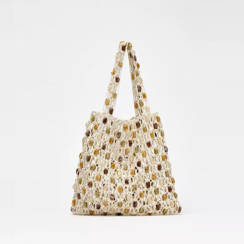 2025 autumn new women's bag light luxury atmospheric bead bag, simple and fashionable, niche woven bag, checkered beach bag, designer shoulder ba