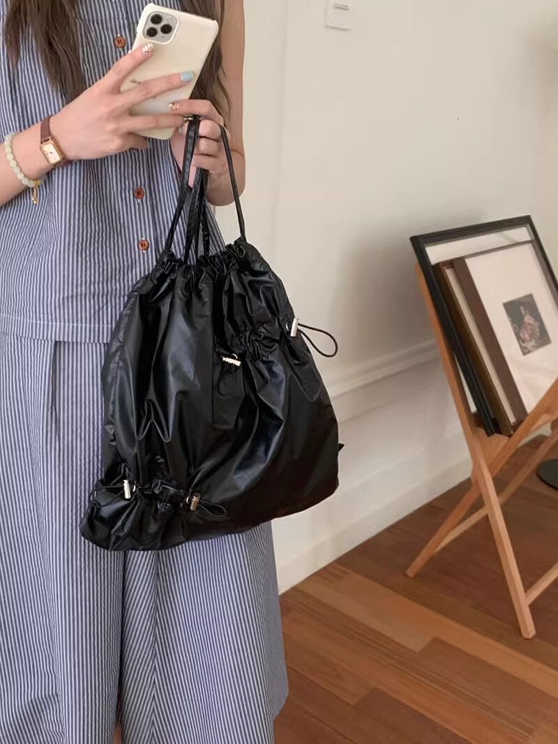 2025 autumn new Korean version atmospheric pleated niche design multifunctional simple casual large capacity shiny backpack fashion designer backpack