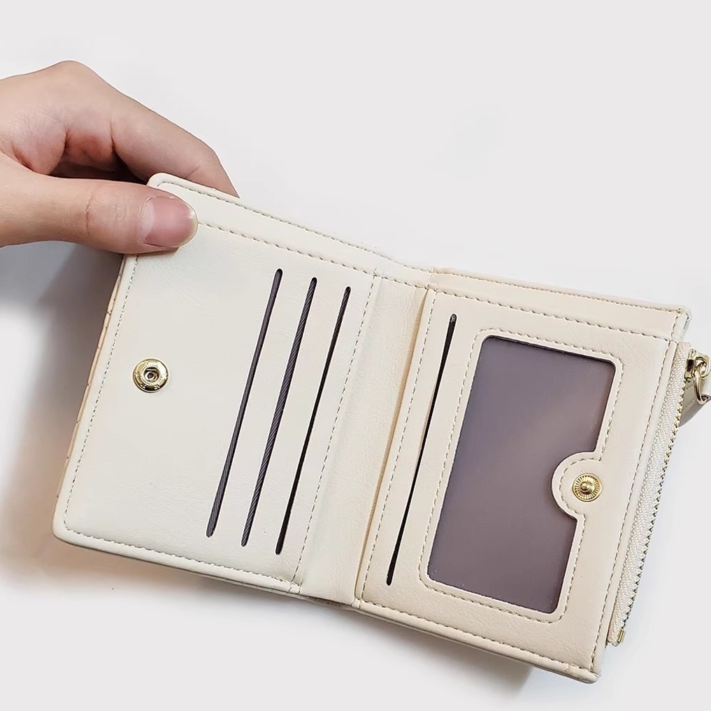2025 autumn new cream small square Japanese style niche light luxury simple mini elegant women's short coin wallet card bag designer wallet