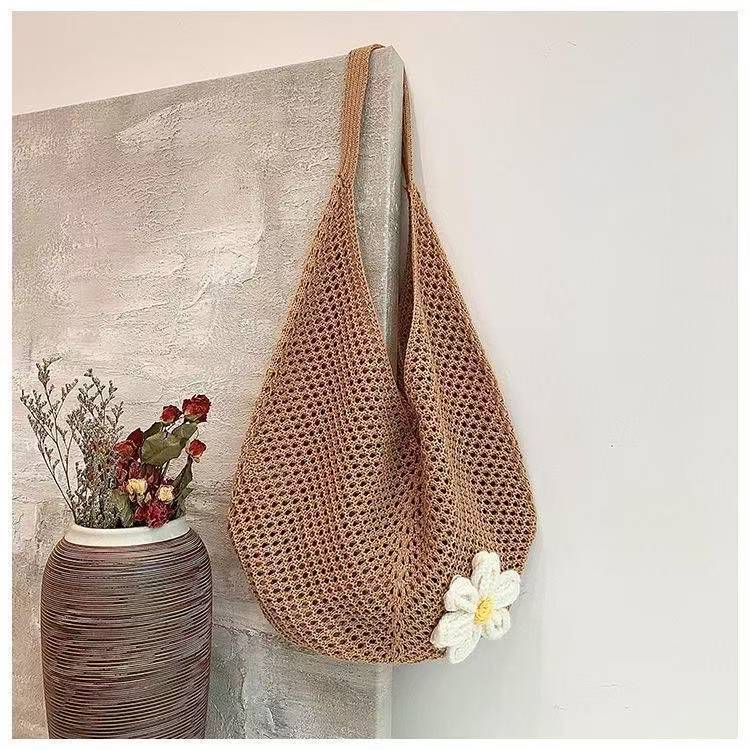 2025 Autumn New Women's Knitted Woven Bag Korean style Simple, Small and Popular bag Lazy Knitted Hollow Flower Beach Bag Designer Shoulder Bag