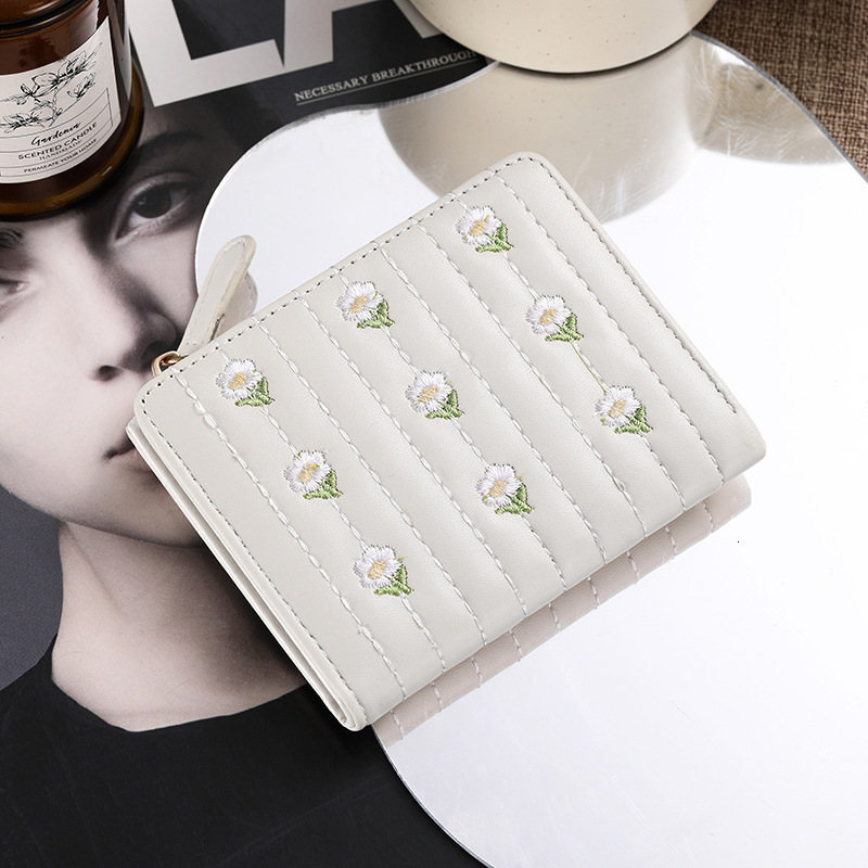 2025 autumn new cream small square Japanese style niche light luxury simple mini elegant women's short coin wallet card bag designer wallet