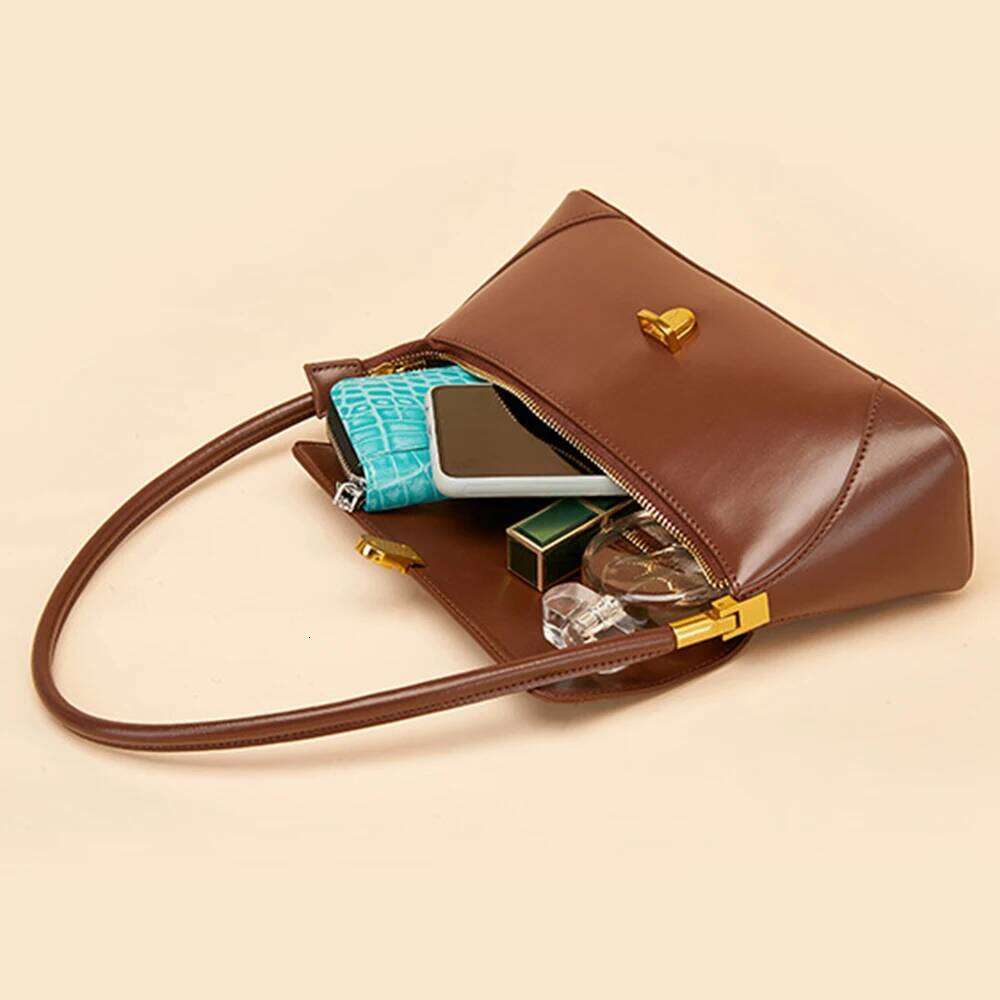 New Leather Women's Fashionable New French Stick High-End Designer Shoulder Bag, Trendy Commuting Handbag