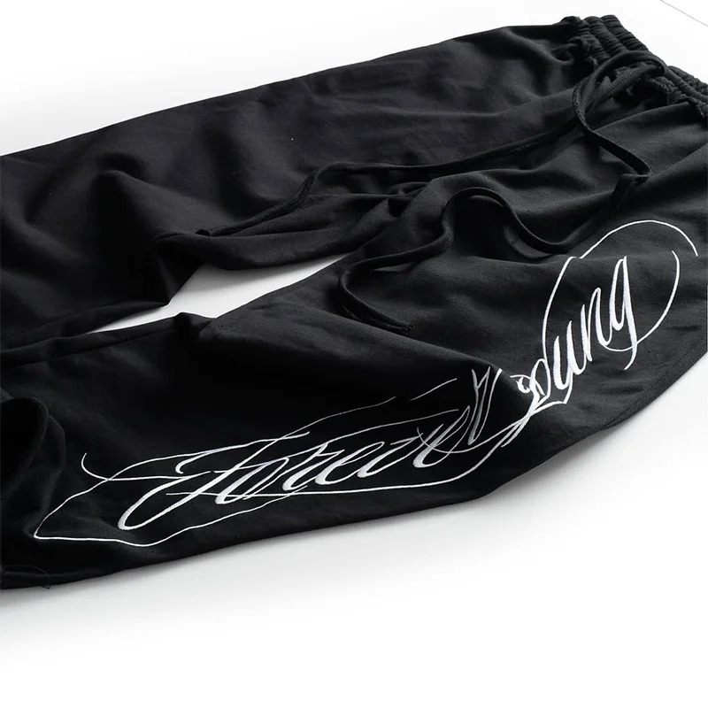 Y2K Hip Hop Loose Pants Fashion Graffiti Style Letters Printing Casual Drawstring Sweatpants Men Women Comfort Streetwear Z260315