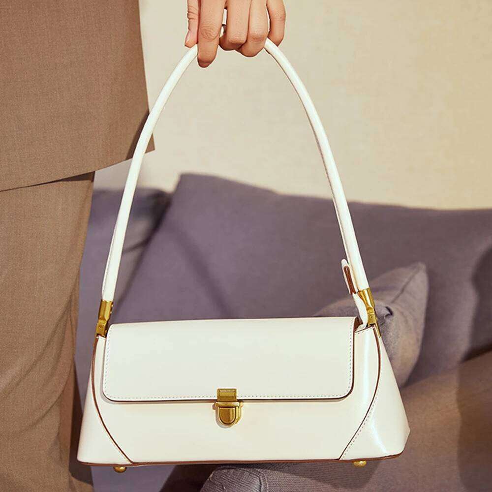 New Leather Women's Fashionable New French Stick High-End Designer Shoulder Bag, Trendy Commuting Handbag