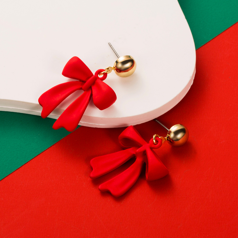 Christmas themed Unique Earrings for Women Simple Bell Bow inspired Asymmetric Earhooks with Enamel filled Alloy Design