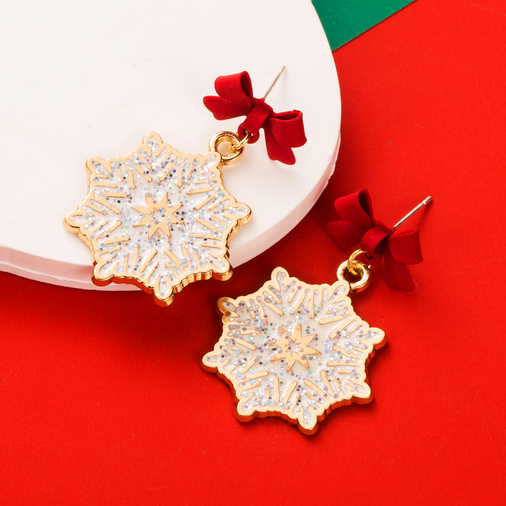 New Christmas themed Earrings Alloy S925 Silver Needle Bow shaped Earrings with Enamel filled and Diamond inlaid Snowflake Droplets Best selling