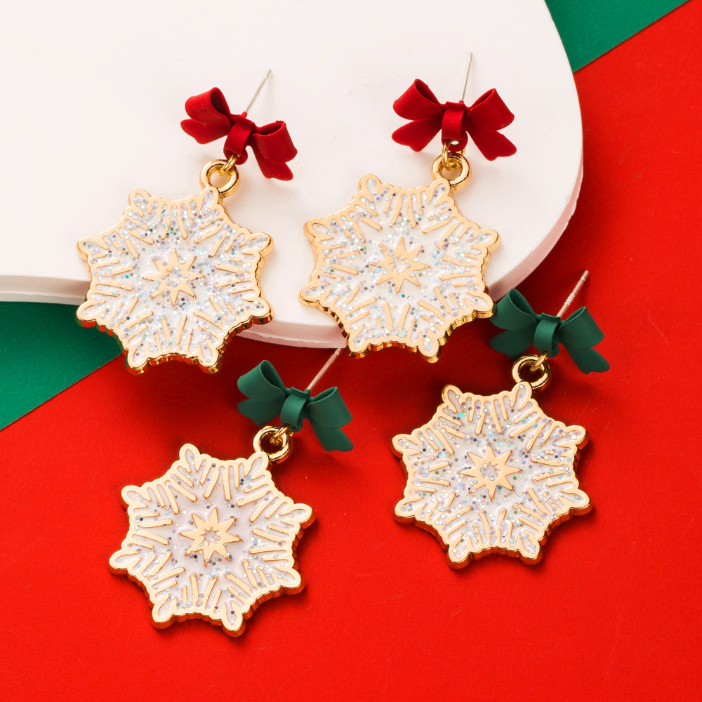 New Christmas themed Earrings Alloy S925 Silver Needle Bow shaped Earrings with Enamel filled and Diamond inlaid Snowflake Droplets Best selling