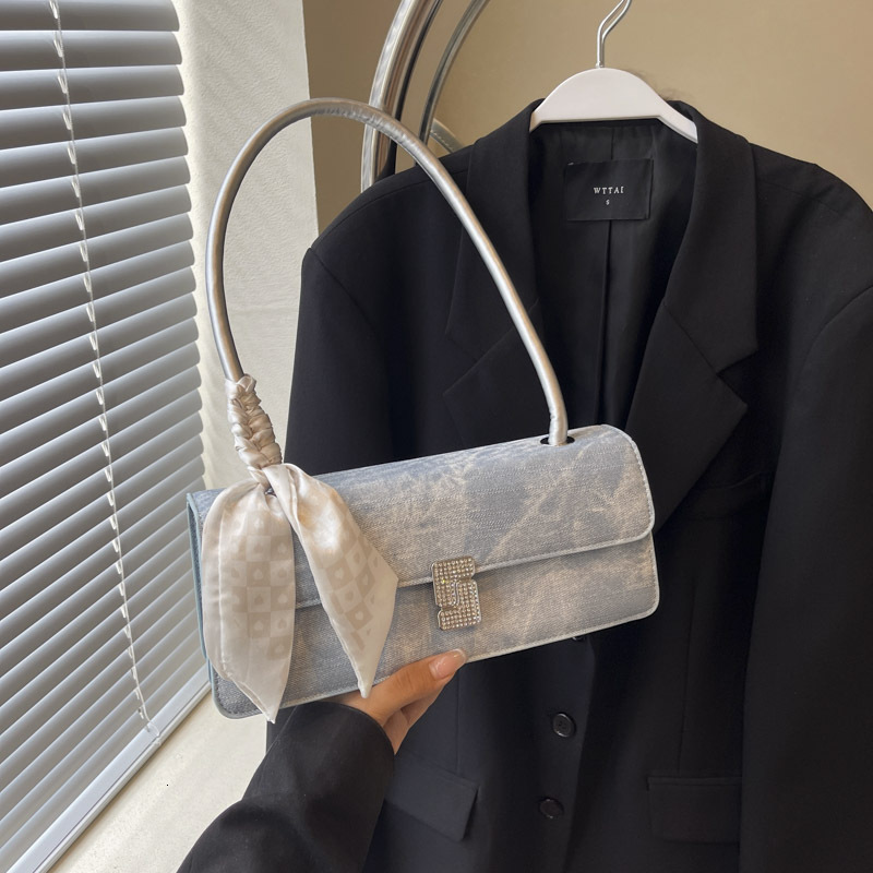 High-end Stylish Luxury Bagdesigner Free Shipping Silver Bag For Women 2025 New French Niche Single Shoulder Underarm Bag Fashion Handbag Baguette Bag