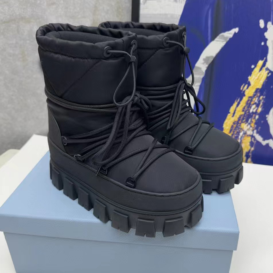 Fashionable snow boots women with thick soles toothed insulation Luxury Designer Boots with waterproof fabric rounded triangular decoration Casual Rainboots