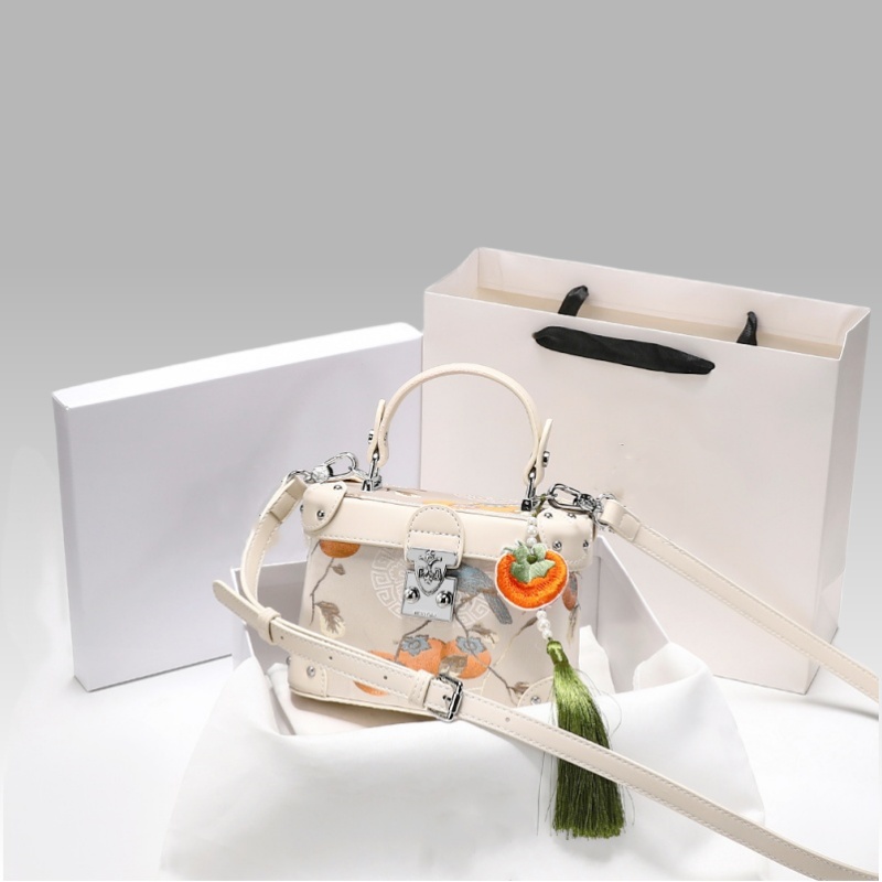 2025 Exquisite Handbag with Unique Pattern and a Green Tassel Charm for Daily Outings and Social Events