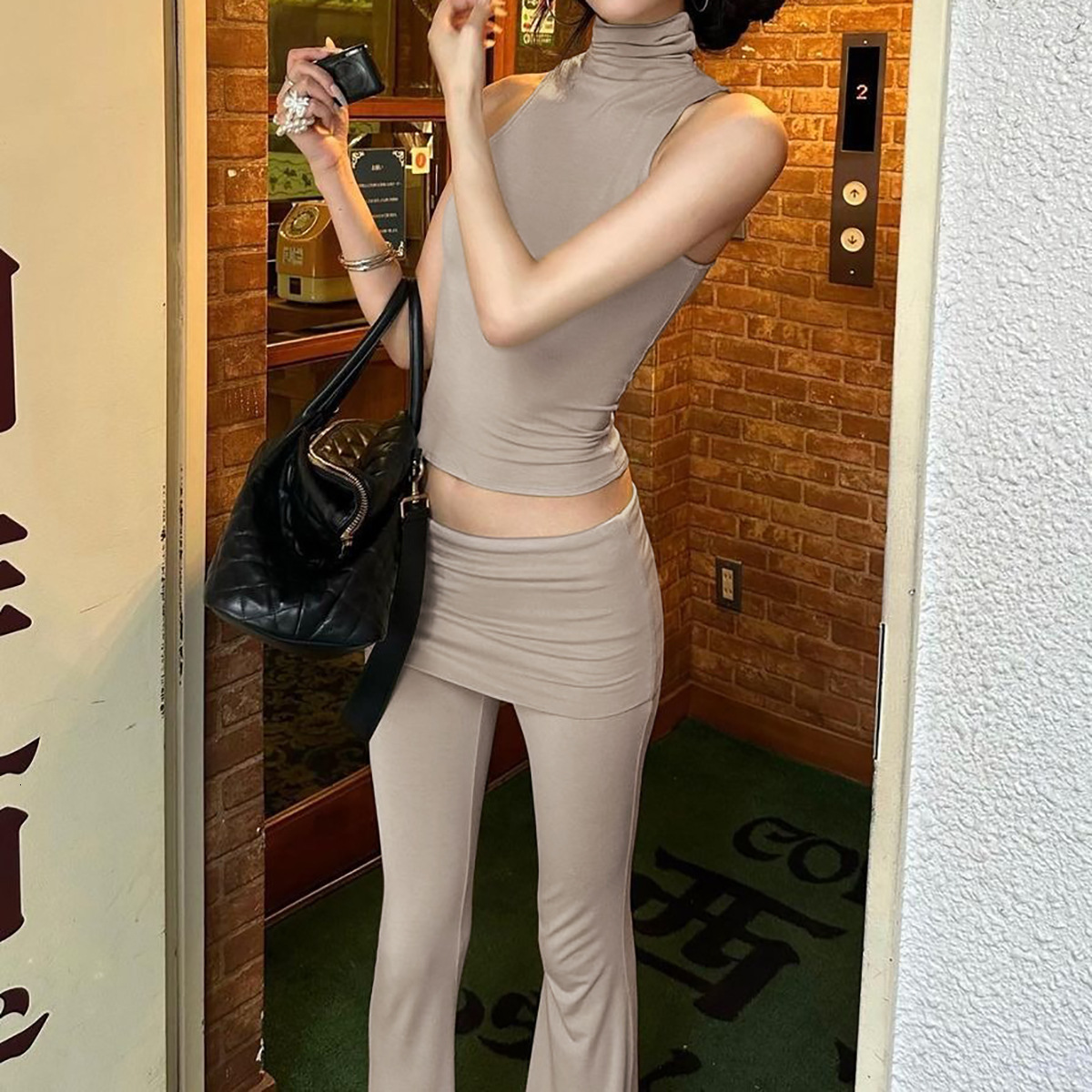 Women's Clothing New Summer New Product Fashionable And Personalized Sleeveless Top Slim Fit High Waisted Flared Pants Set