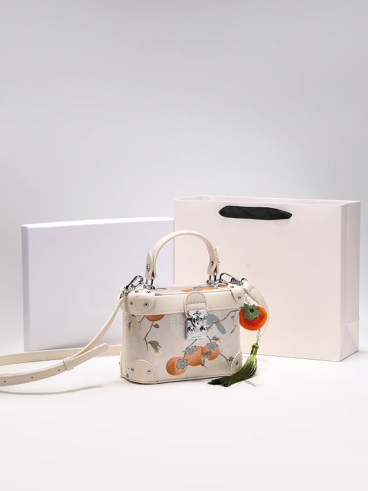 2025 Exquisite Handbag with Unique Pattern and a Green Tassel Charm for Daily Outings and Social Events