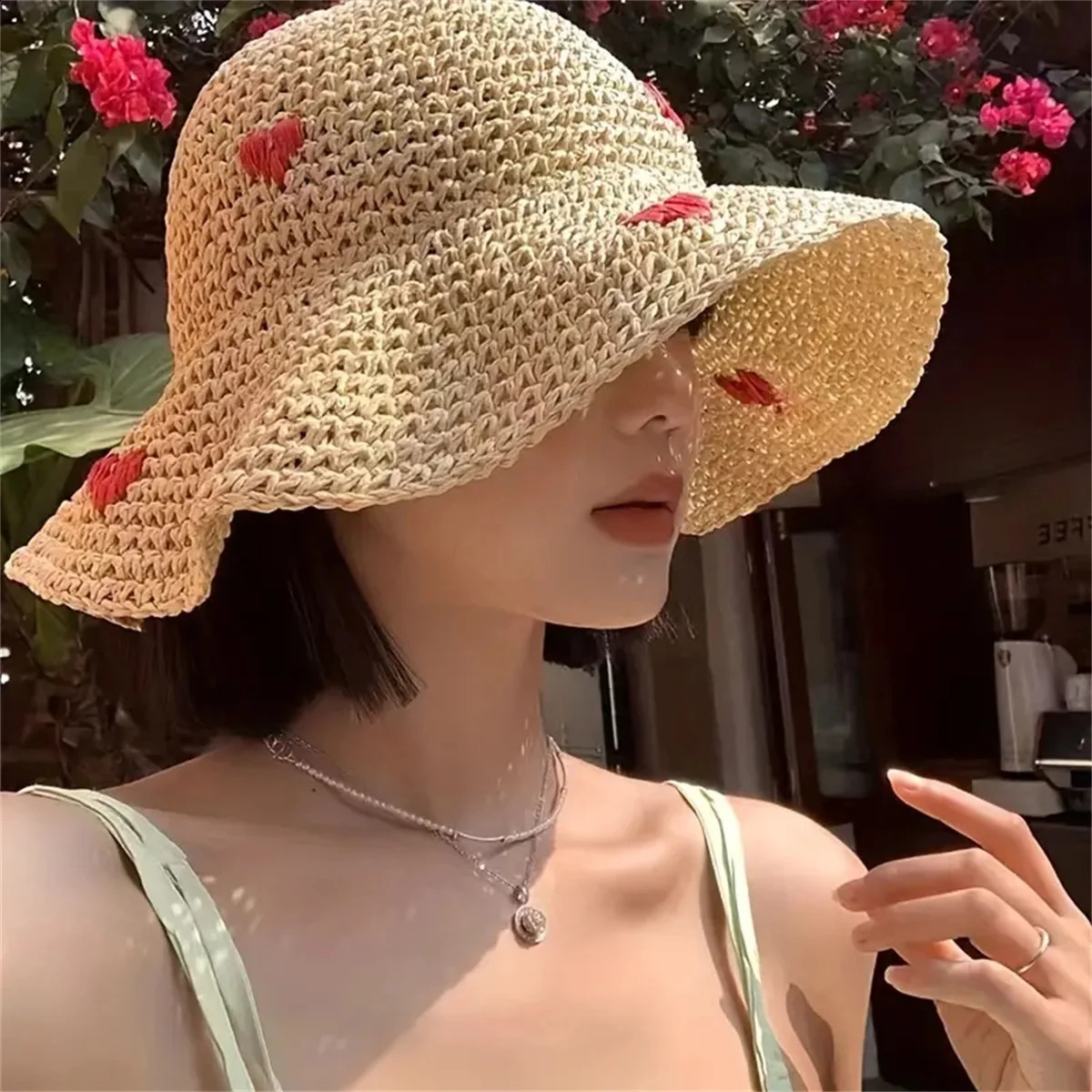 An Insta-style wavy edge large eaves straw fisherman hat womens summer braided love straw hat holiday beach breathable sunshade 250227