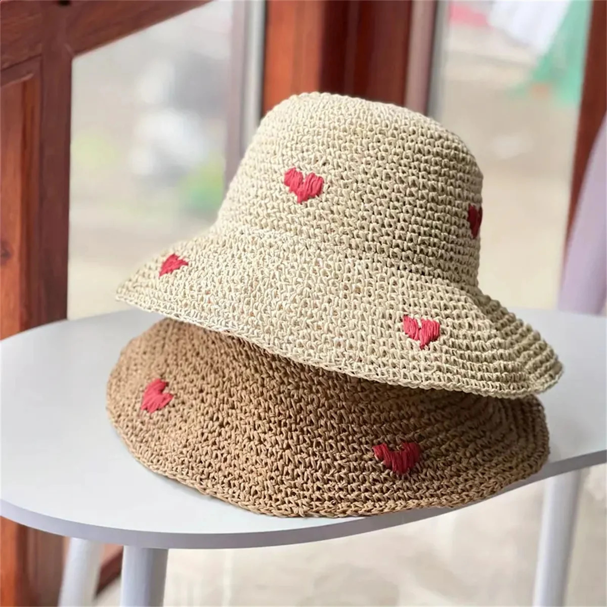 An Insta-style wavy edge large eaves straw fisherman hat womens summer braided love straw hat holiday beach breathable sunshade 250227