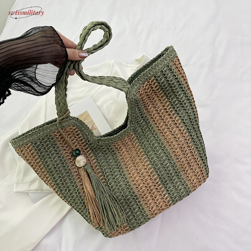 Large capacity grass woven for women's spring and summer 2025 new item, niche design, contrasting color, single shoulder beach vacation bucket ba