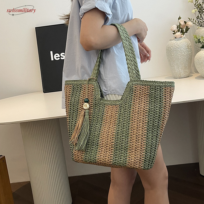 Large capacity grass woven for women's spring and summer 2025 new item, niche design, contrasting color, single shoulder beach vacation bucket ba
