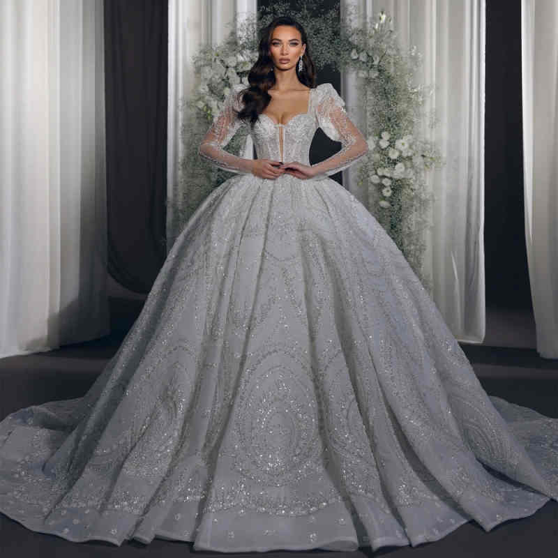 Brilliant Wedding Dresses Ball Gown Deep V-Neck Lace Crystal Appliques Beading with Bling Sequins Floor-Length Court Gown Customized Bridal Gowns Vest