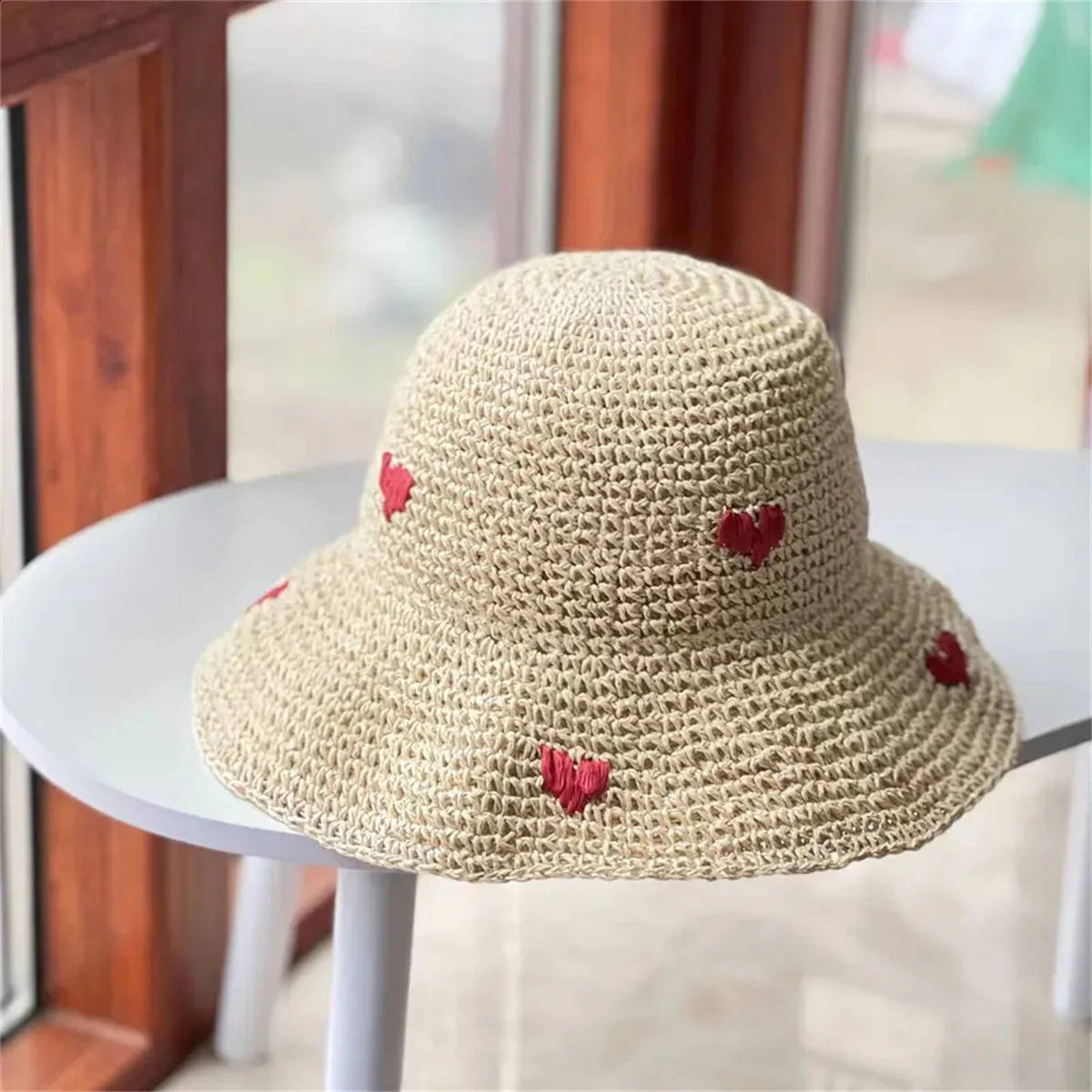 An Insta-style wavy edge large eaves straw fisherman hat womens summer braided love straw hat holiday beach breathable sunshade 250227