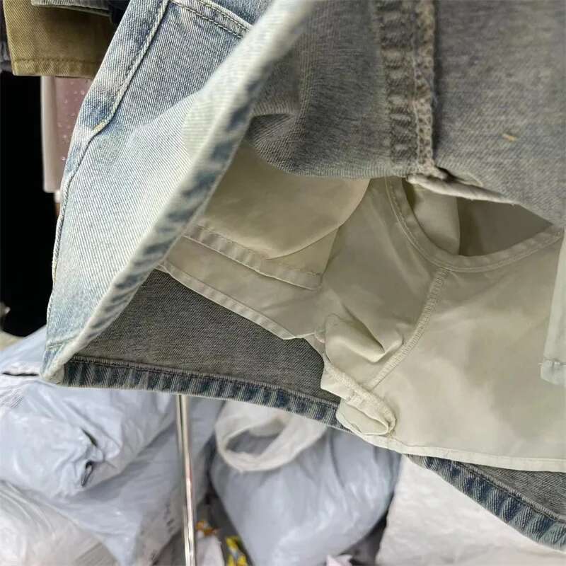 Cool collar designer women's short denim skirt 2025 summer new spicy girl high waist light blue denim skirt2