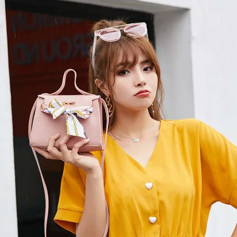 2025 New Women's Ribbon PU Leather Bow Decoration Mini Flip Cover Handbag Women's Fashion Single Shoulder Bag Crossbody Bag Handbag