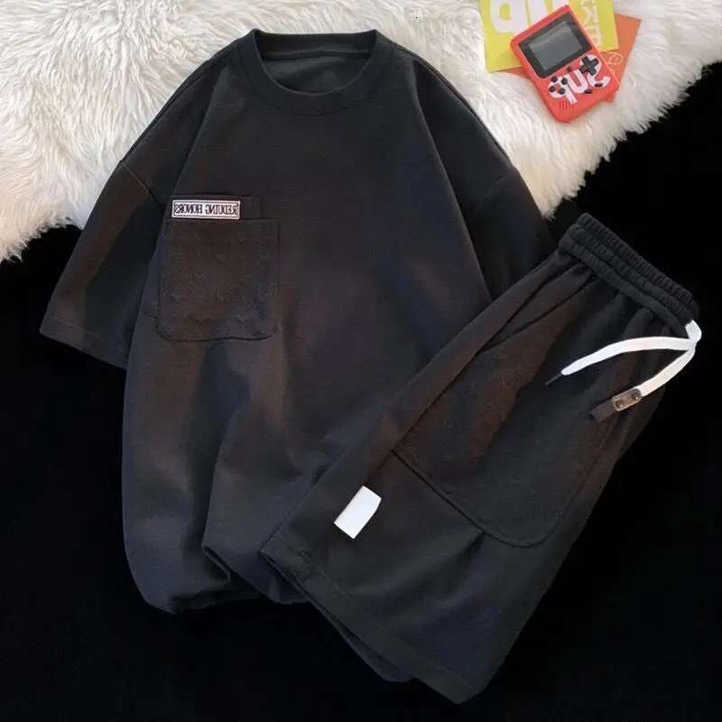 2025 new summer loose short sleeved couple O-neck pocket simple casual wild T-shirt shorts men's and women's designer two-piece suit4