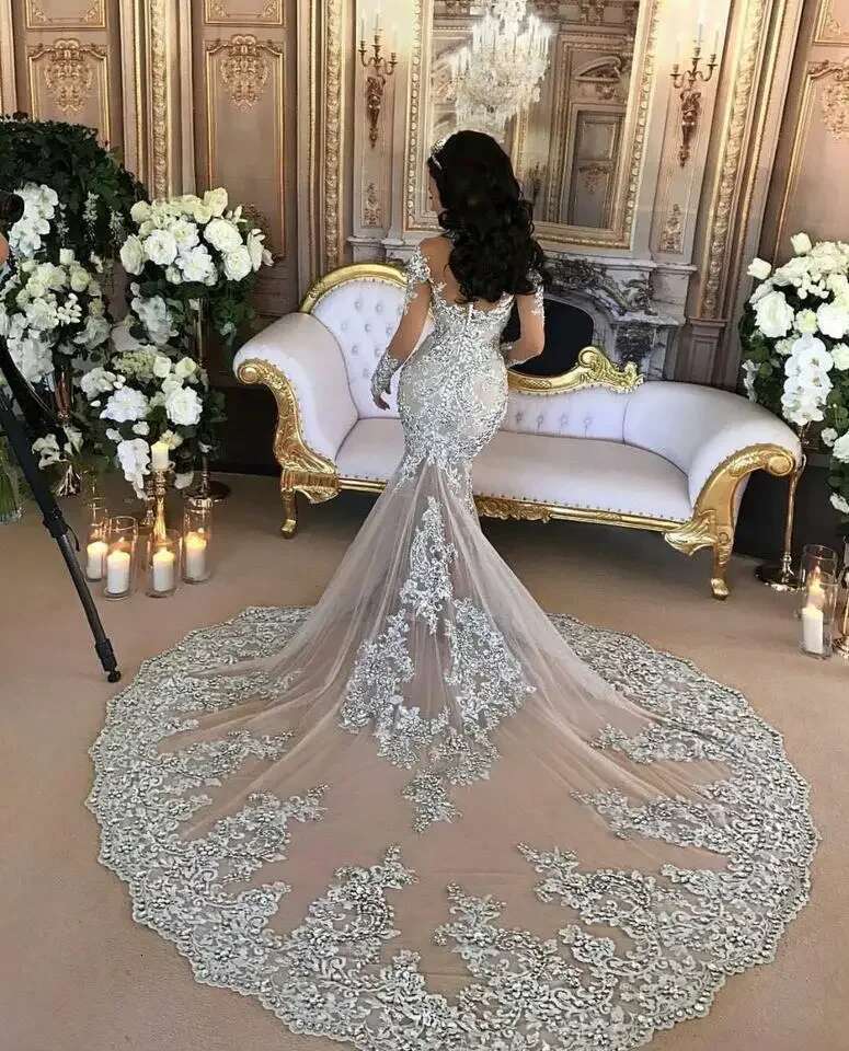 Customized Sparkly Wedding Dresses 2025 Sexy Beaded Lace Applique High Neck Illusion Long Sleeves Mermaid Bridal Gowns