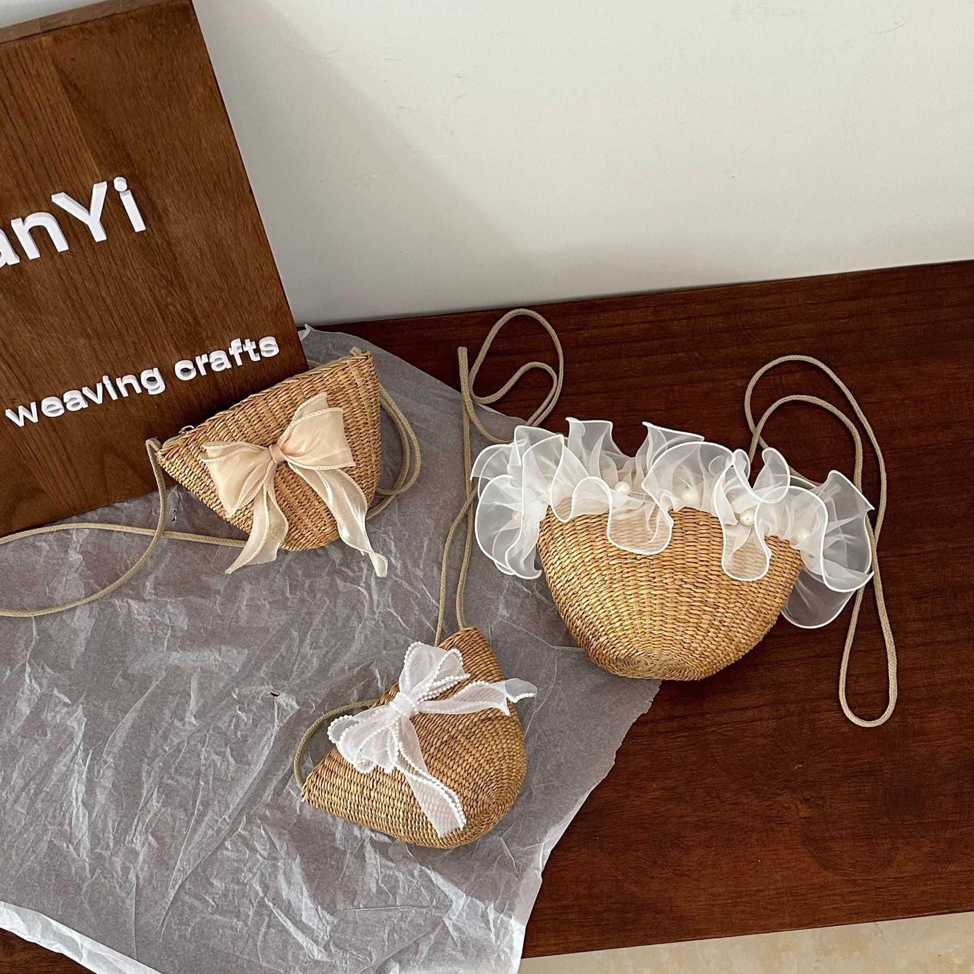 Ins children's cute handmade woven bag crossbody bag beach grass woven bag baby coin purse yellow grass bag internet celebrity