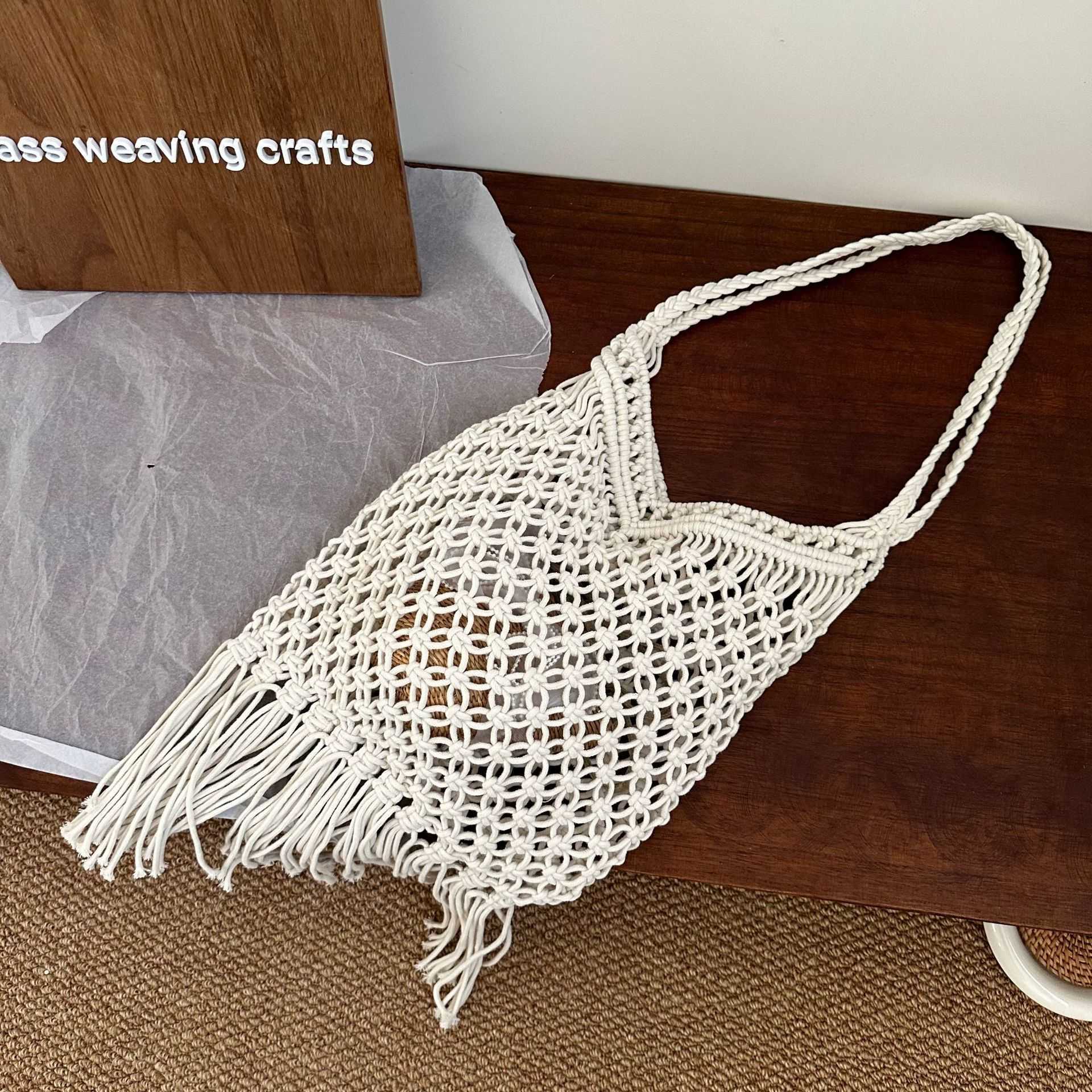 Trendy forest style hollowed out handmade woven bag, grid tassel cotton rope shoulder bag, beach tourism vacation beach bag