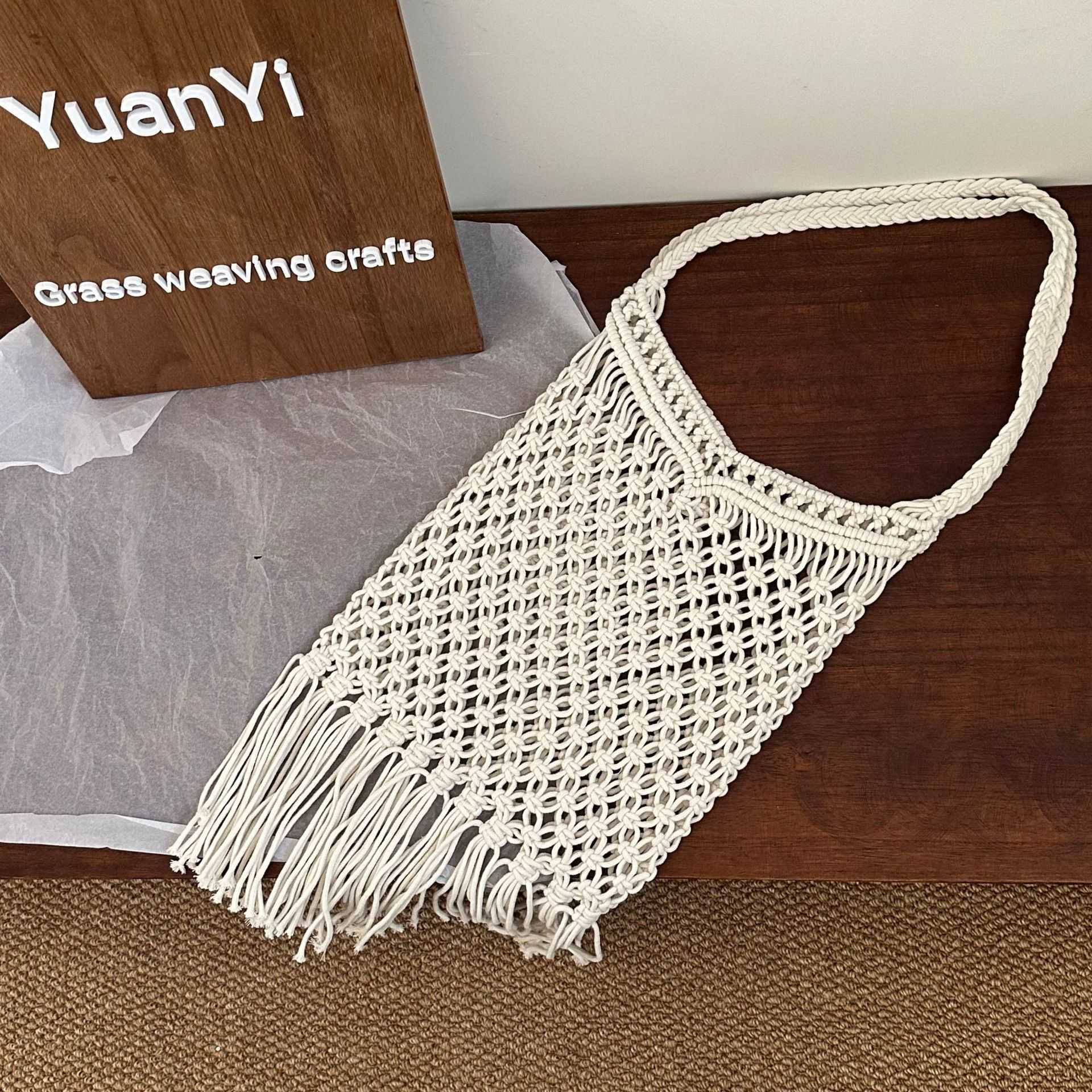 Trendy forest style hollowed out handmade woven bag, grid tassel cotton rope shoulder bag, beach tourism vacation beach bag