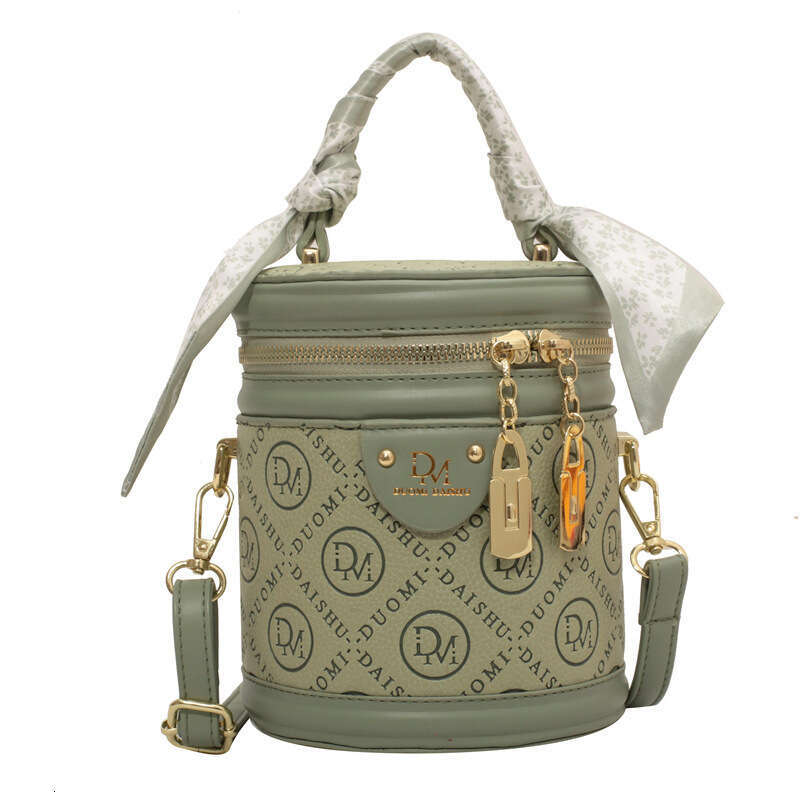 Solid color texture small for women's autumn 2025 new trendy and fashionable niche hand-held circular bucket crossbody bag