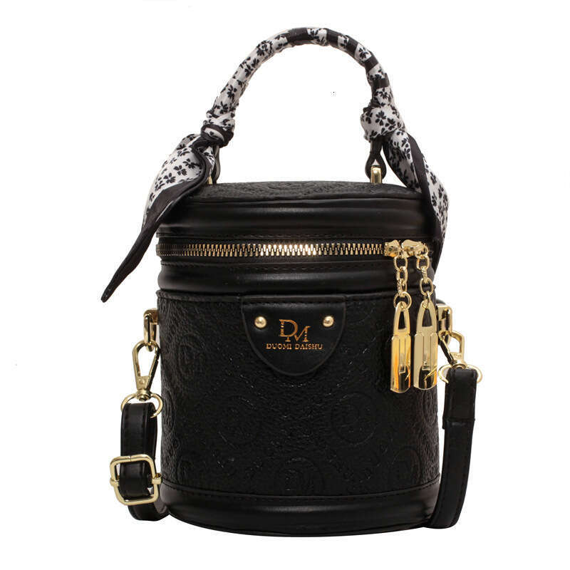 Solid color texture small for women's autumn 2025 new trendy and fashionable niche hand-held circular bucket crossbody bag