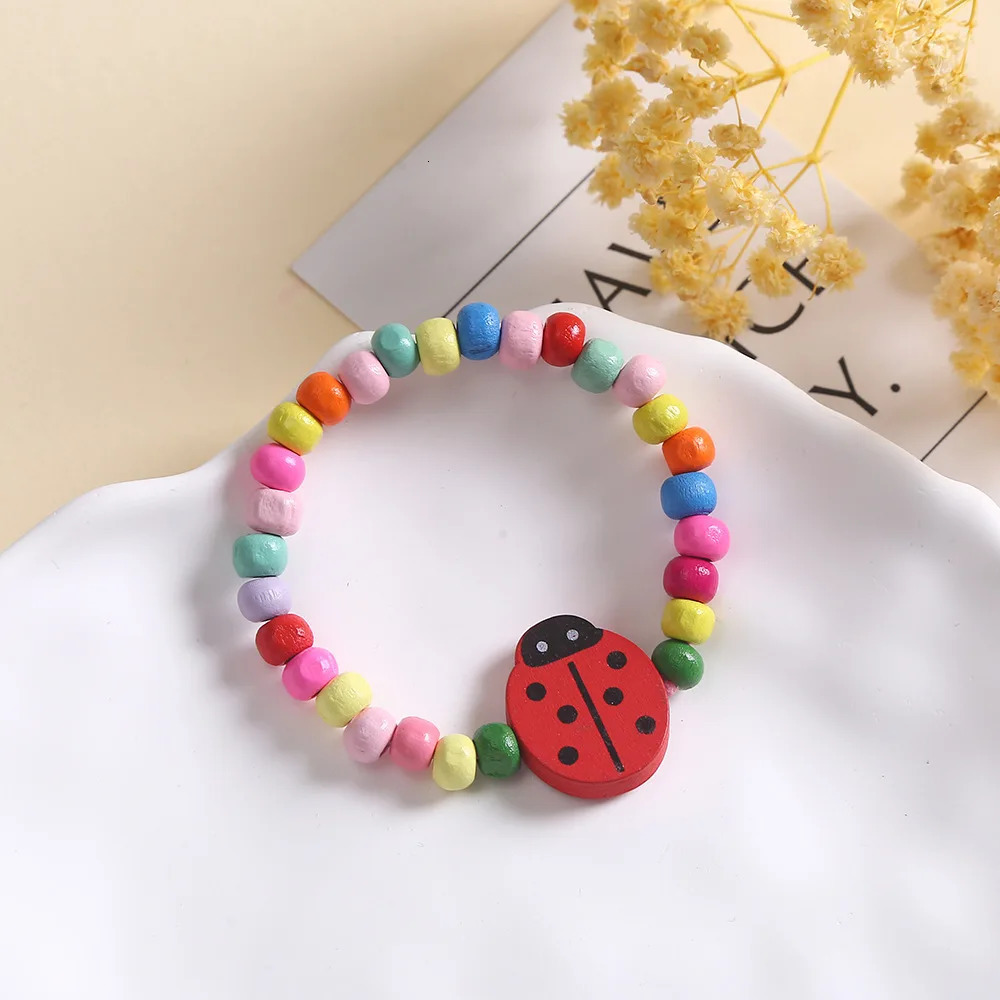50Pcs/Set Cartoon Children Wooden Beads Color Bracelet for Girl Birthday Party Favors Baby Shower Guest Gifts Pinata Fillers 250304