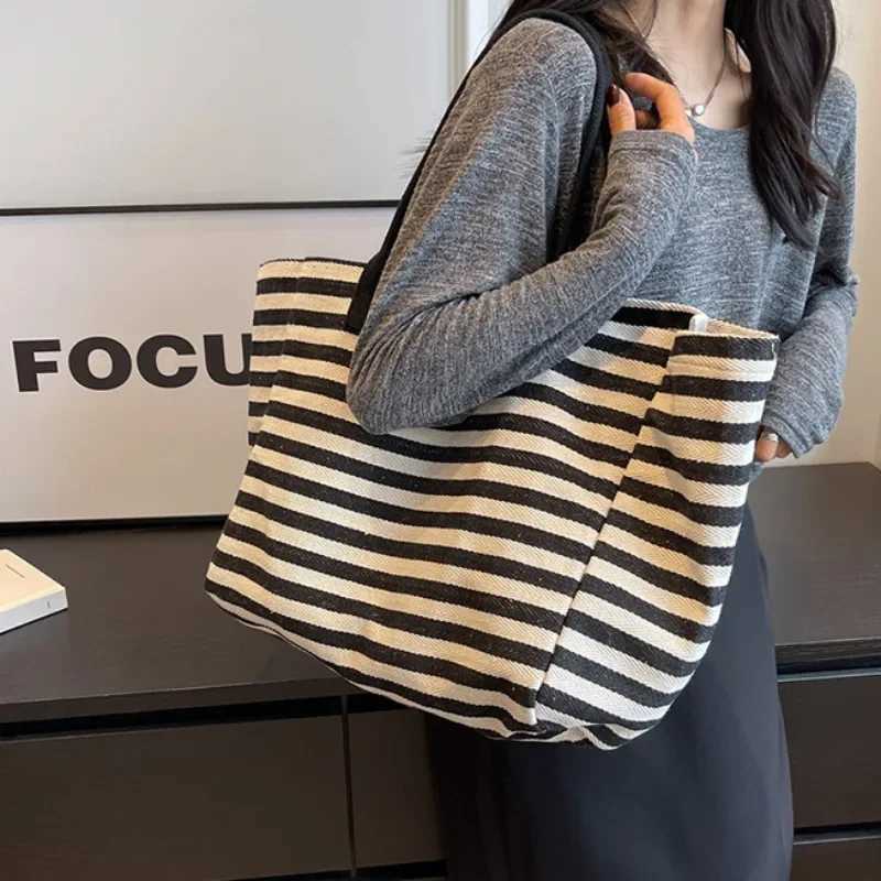 Commuter bag womens fashionable large capacity handbag student striped 2024 new niche zebra canvas single shoulder mom Y250304
