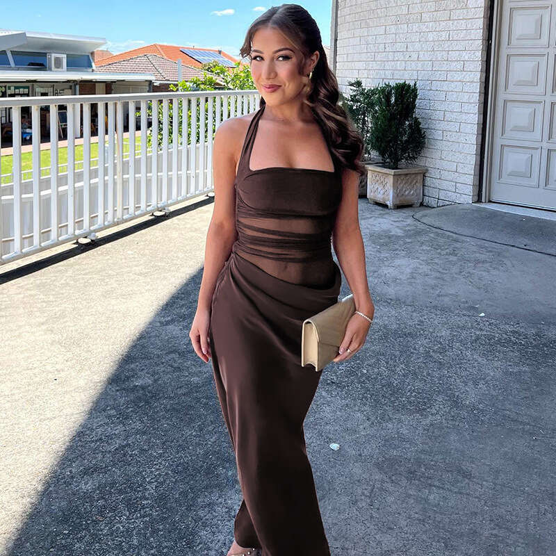Sexy mesh patchwork dress with slim fit, backless, solid color, waist, hanging neck, slit style long skirt