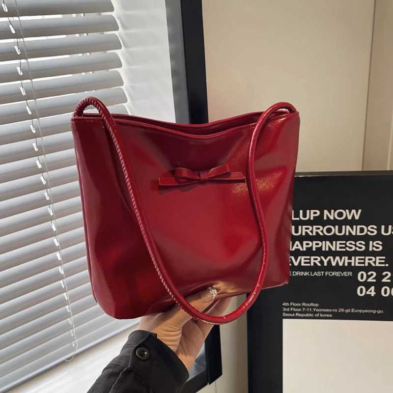 Trend Bow Red Bucket Bags for Women 2024 New Simple Commuting Handbag Korean Pu Leather Casual Versatile Womens Shoulder Bag Z250303
