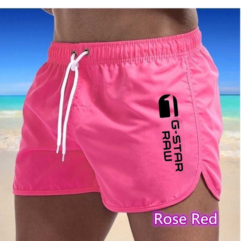 New mens quick drying and breathable beach swimming pants with multi-color printed sports and fitness shorts for external wearT250304