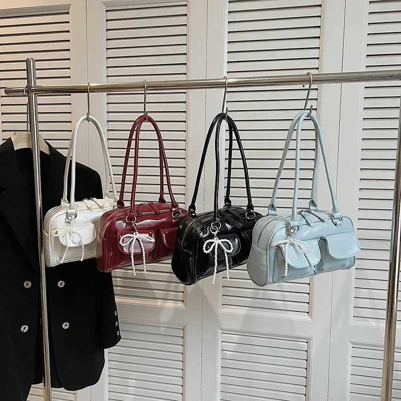 Solid sewing thread fashionable glossy PU shoulder bag Baguette Versatile handbag 2025 hot selling womens bag Bolsas Femininas Y250303