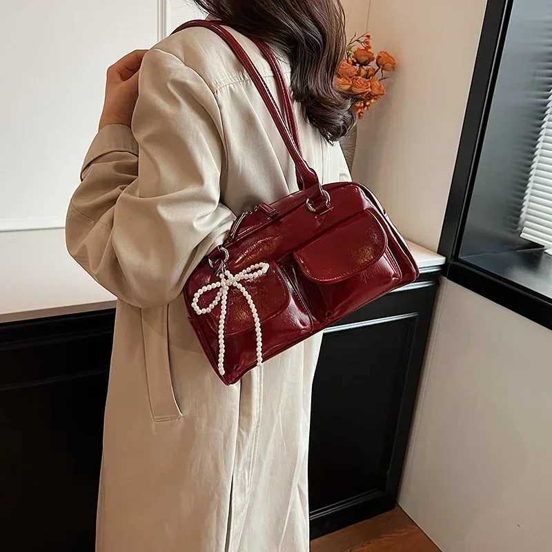 Solid sewing thread fashionable glossy PU shoulder bag Baguette Versatile handbag 2025 hot selling womens bag Bolsas Femininas Y250303