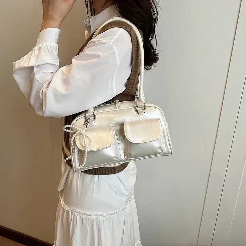 Solid sewing thread fashionable glossy PU shoulder bag Baguette Versatile handbag 2025 hot selling womens bag Bolsas Femininas Y250303