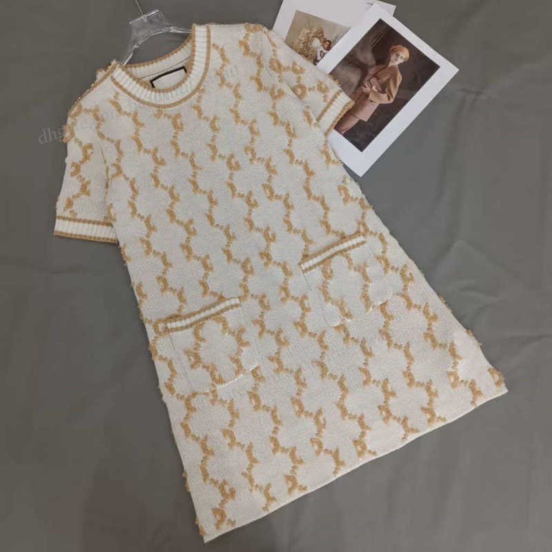 Luxury Designer Basic & Casual Dresses Early autumn round neck shoulder button towel embroidered letter short sleeved knitted dress short sleeved skirt