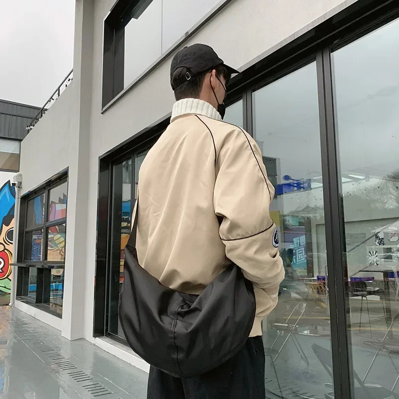 Mens and womens shoulder bag leisure student bag high quality Oxford womens messenger bag waterproof outdoor fitness bag 250303