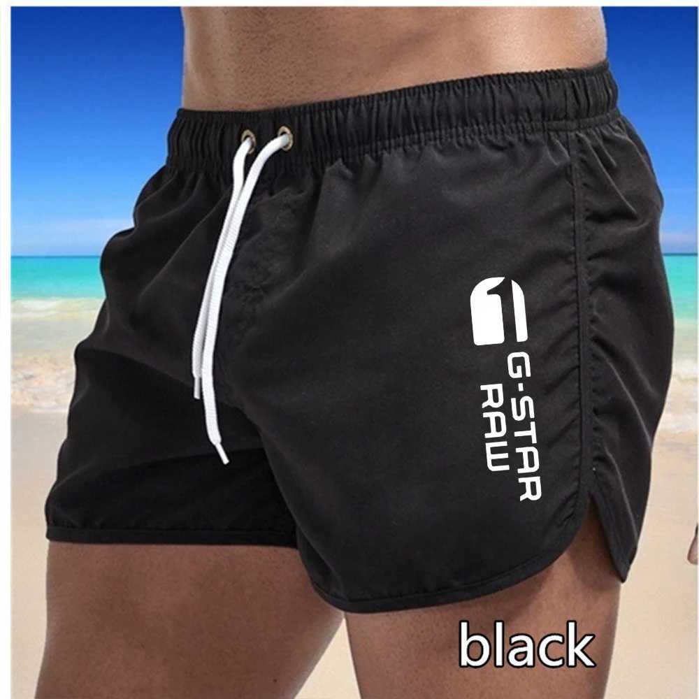 New mens quick drying and breathable beach swimming pants with multi-color printed sports and fitness shorts for external wearT250304