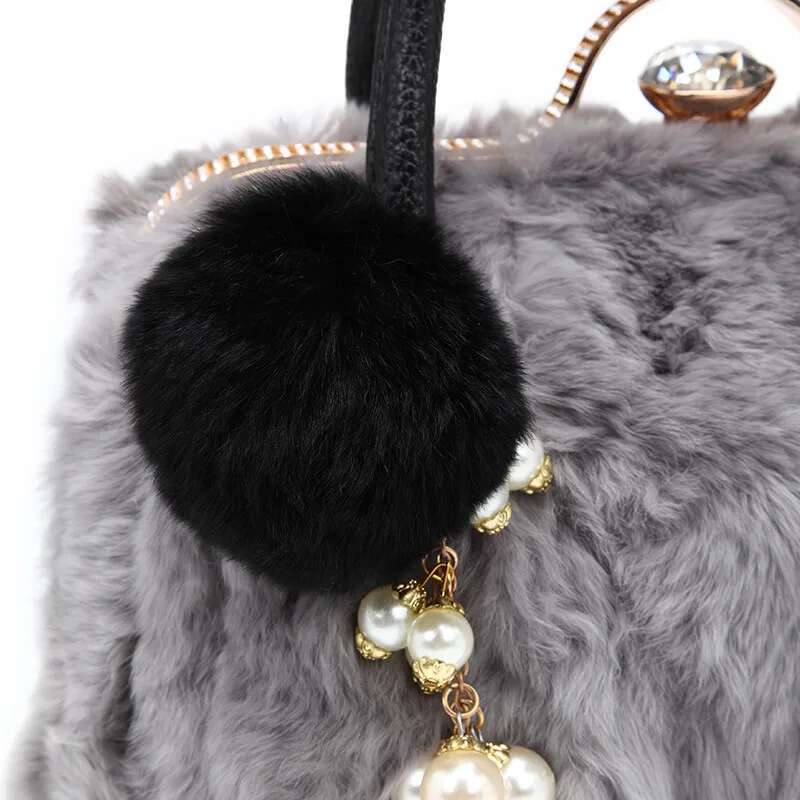 2024 New 100% Rabbit Fur Shoulder Bag Winter Fashion Ladies Plush Dia Ball Tassel Women Designer Handbags