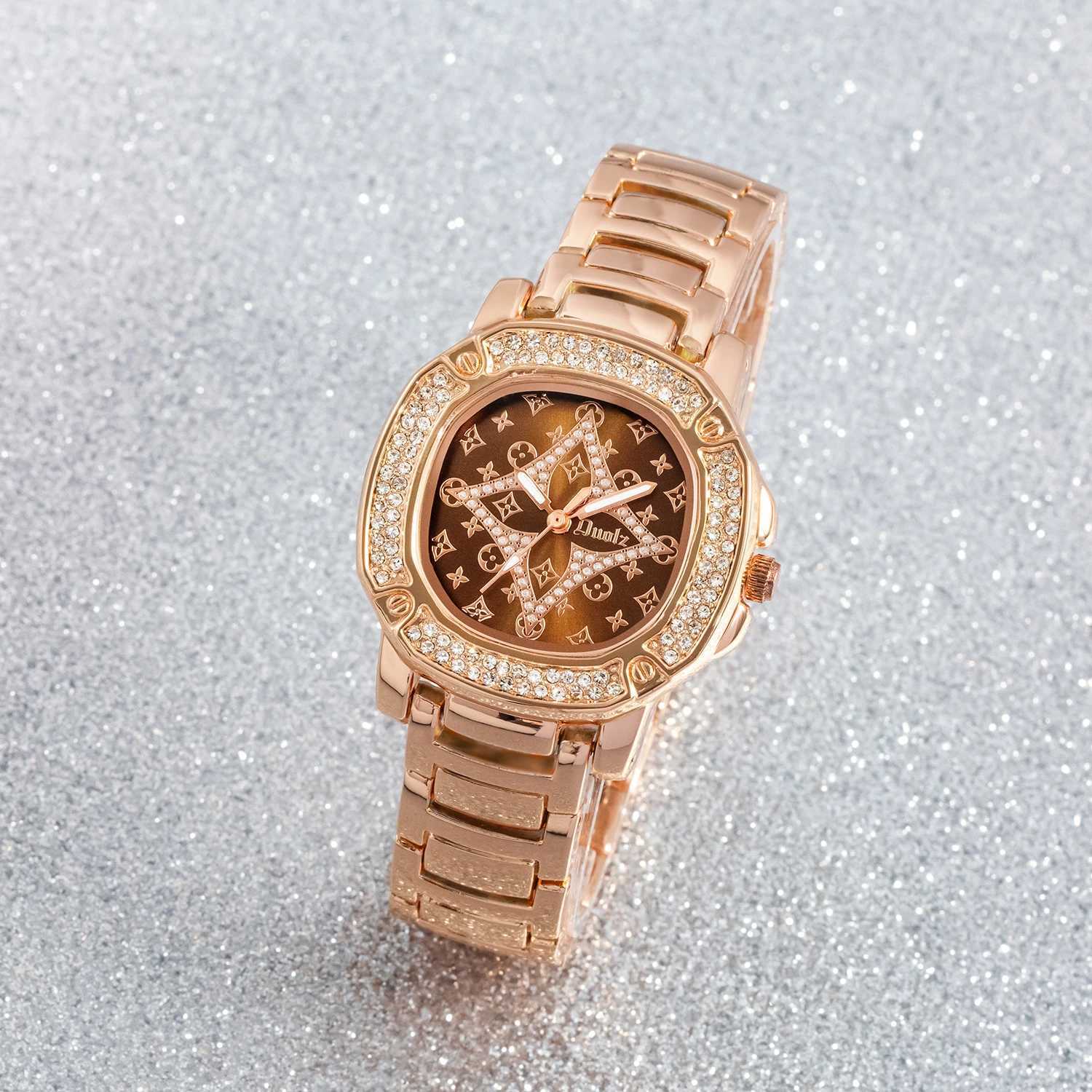 Elegant and fashionable ladies rose gold inlaid with diamond dial exquisite ladies quartz waterproof dialXJ250304