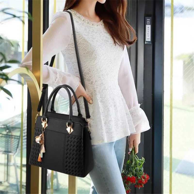 Fashion black womens simple handbag womens handbag tassel PU leather handbag top handbag embroidered cross body bag shoulder bag Z250303