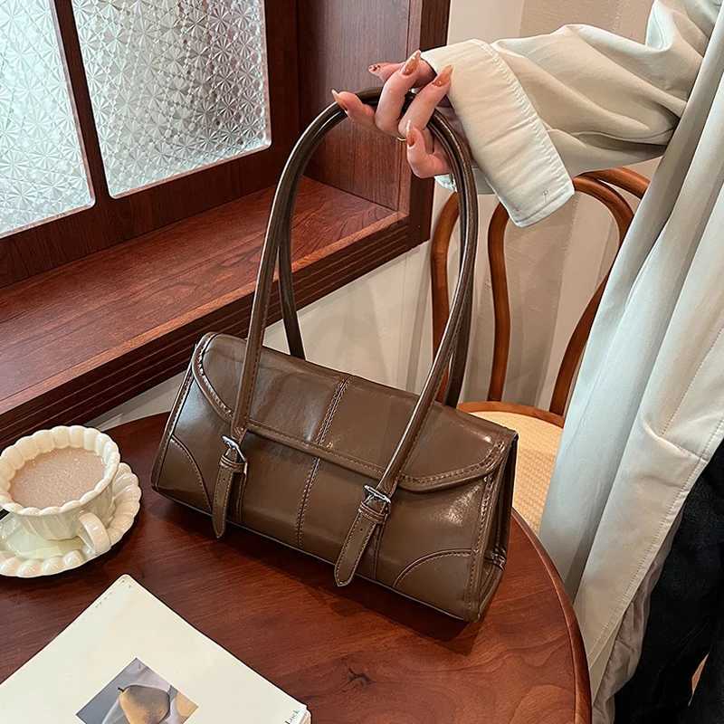 2024 hot selling wine red shoulder bag womens waterproof belt buckle design handbag French brand underwear handbag Z250303