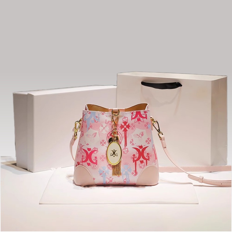 2025 Stylish Bucket Handbag Featuring a Dainty Tassel Pendant and Distinctive Print Pattern crafted from high - quality leather