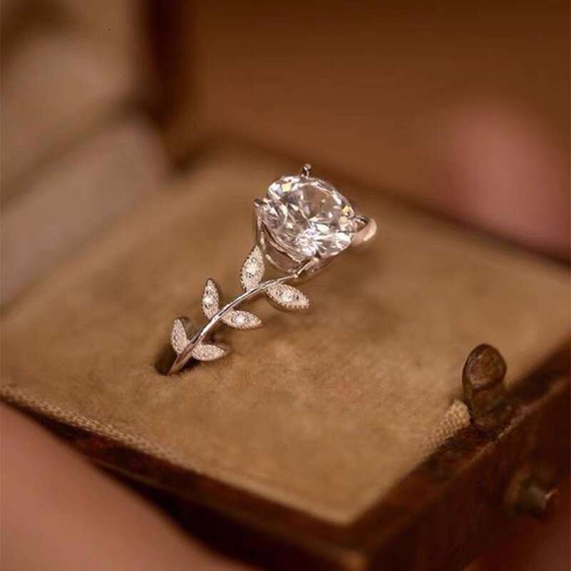 Feiyu personality light luxury laurel branch leaf copper inlaid zircon women's fashionable small fresh silver daily versatile ring